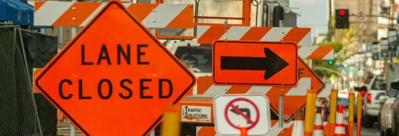 Lane Closed and Right Arrow traffic signs